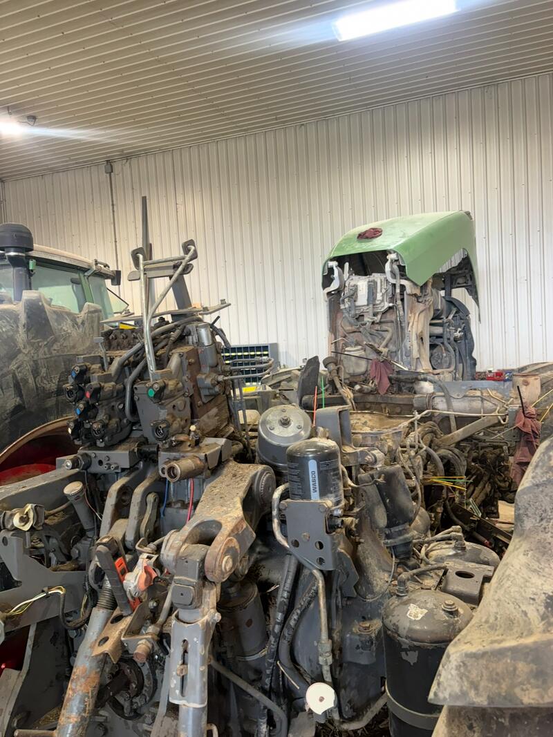 Inside the JCR shop with tractors in for repair