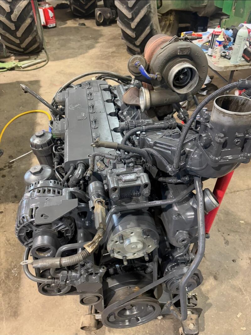 Rebuilt diesel engine on a stand, ready to go back in